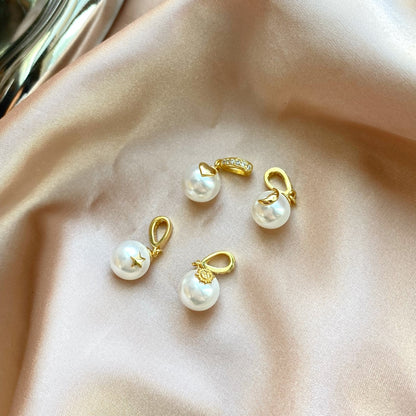 "Ocean Whisper: Silver and Pearl Pendant"