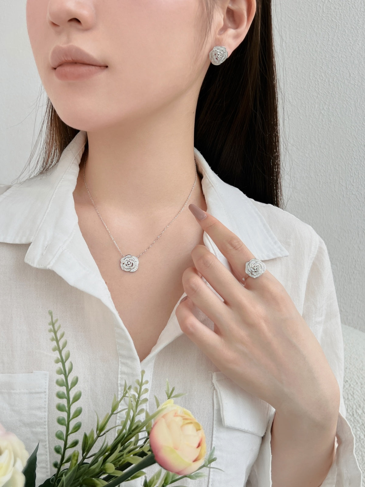 "Blooming Grace: Sterling Silver Necklace with Rosy Floral Motif"