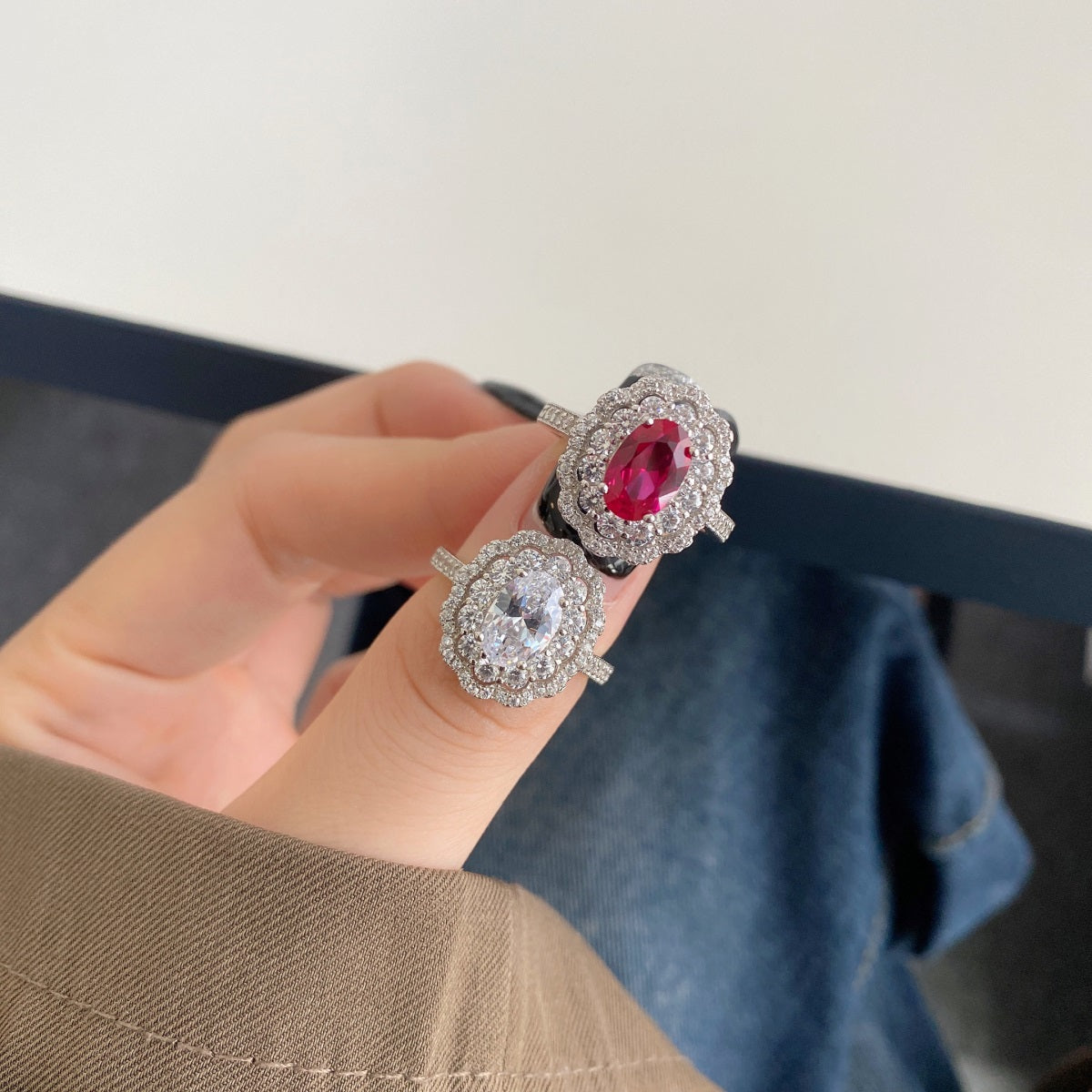 Silver ring with purple zirconia."