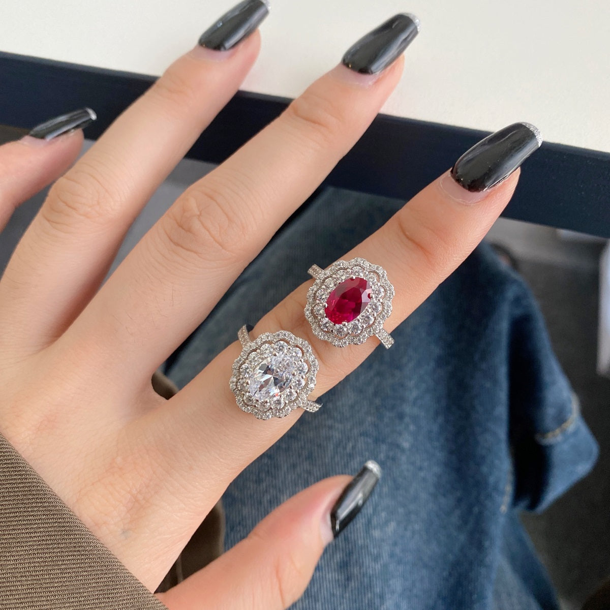 Silver ring with purple zirconia."