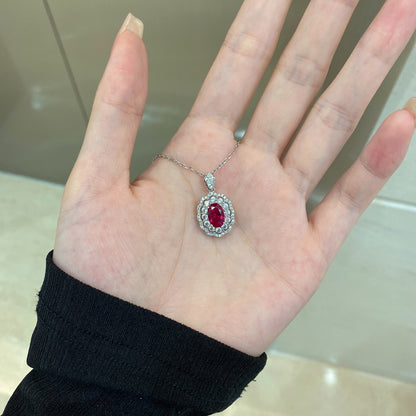 "Silver Necklace with Purple Zirconia."