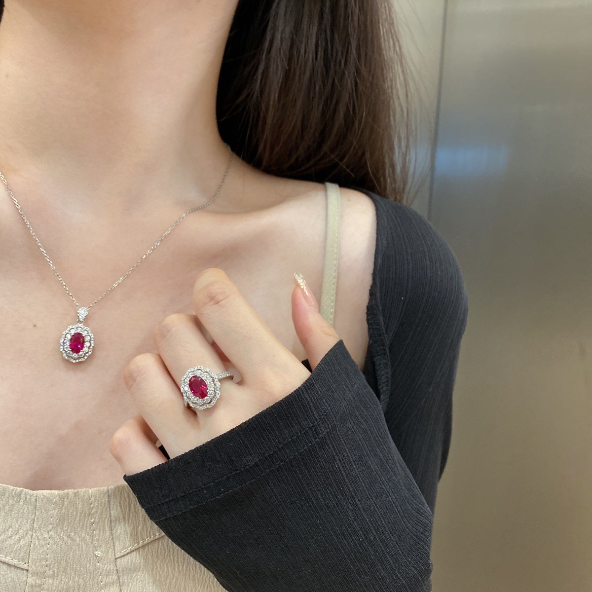 Silver ring with purple zirconia."