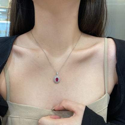 "Silver Necklace with Purple Zirconia."