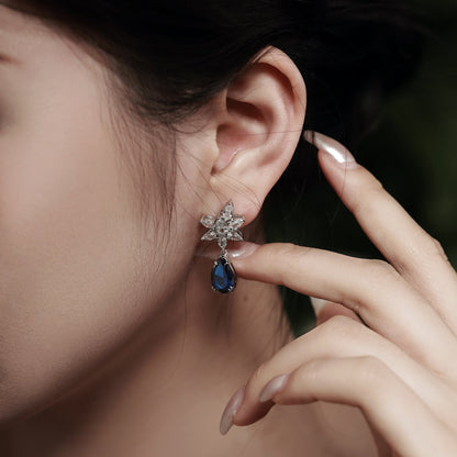 Sapphire Serenity: Silver Drop Earrings in Blue