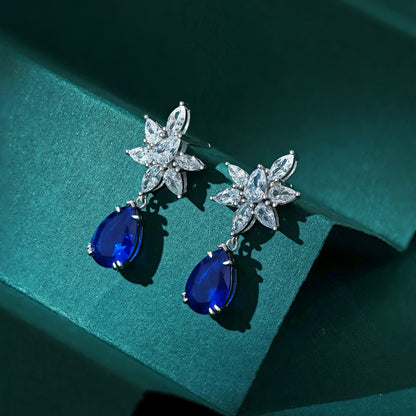 Sapphire Serenity: Silver Drop Earrings in Blue