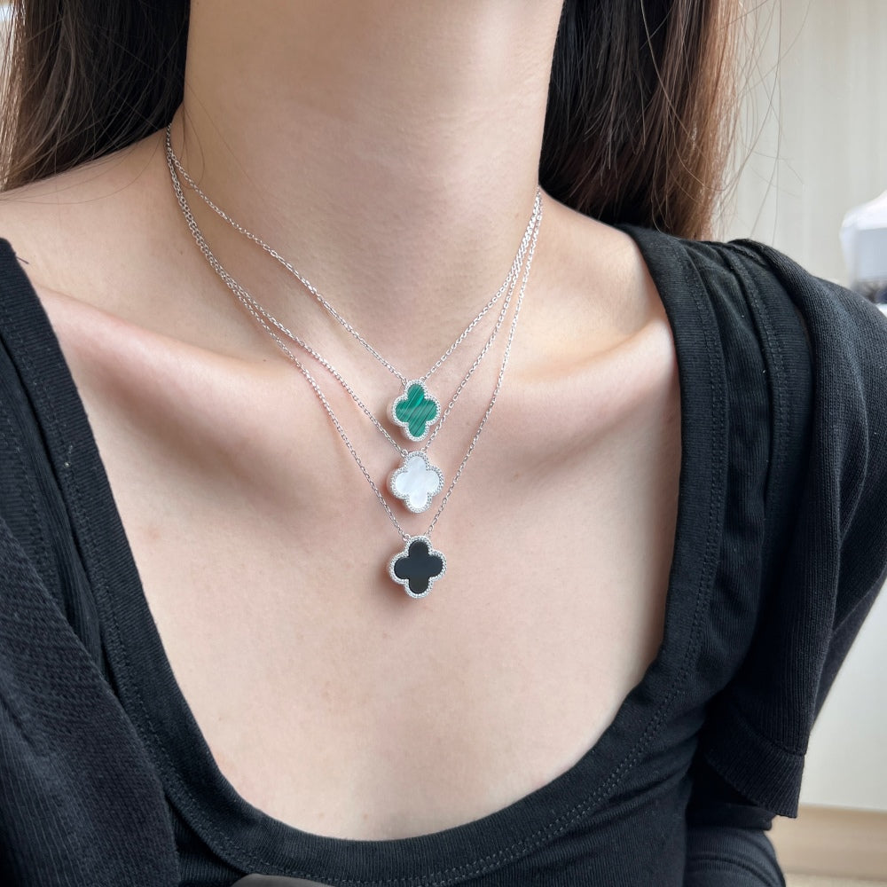 "Lucky Charms: Sterling Silver Clover Necklace" 
